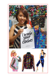 Female tailor in Hanoi Vietnam holding a fair trade poster -  State of Disarray 